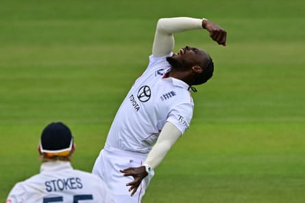Jofra Archer celebrates taking a catch to dismiss India's Washington Sundar off his own bowling