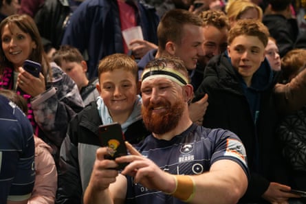 Jake Woolmore takes a selfie with a young Bristol fan.
