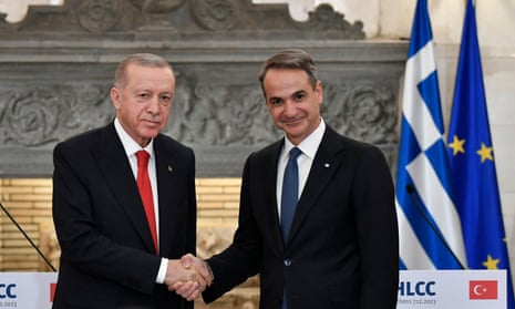 Greece’s prime minister, Kyriakos Mitsotakis, right, shakes hands with Turkey’s president, Recep Tayyip Erdoğan, after their statements at Maximos Mansion in Athens, Greece.