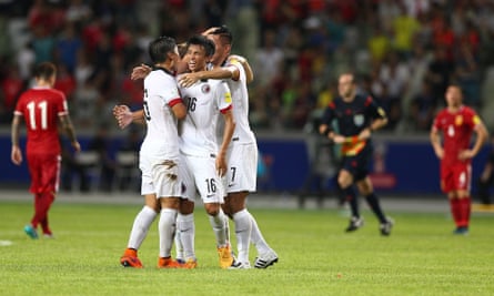 Hong Kong players celebrate after they held China to a 0-0 draw in 2018 World Cup qualifying.
