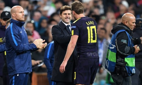 Mauricio Pochettino, Manager of Tottenham Hotspur celebrates with Harry Kane.