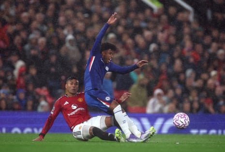 Manchester United's Casemiro fouls Chelsea's Andrey Santos and is later sent off after receiving two yellow cards.