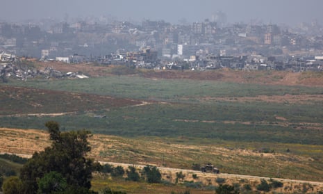 An Israeli military vehicle operates near the Israel-Gaza border.