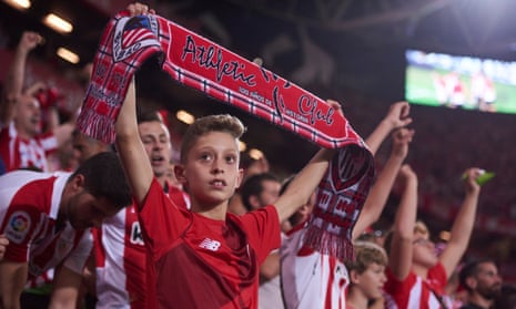 A young Athletic fan watches his side host Real Madrid at the San Mamés stadium in Bilbao.