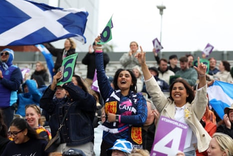 Fans of Scotland react in the crowd.