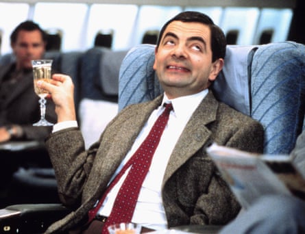 Rowan Atkinson as Mr Bean on an aircraft