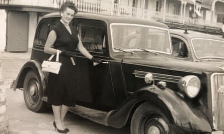 Sylvia Wallis in the late 1950s with the first family car, a Wolseley