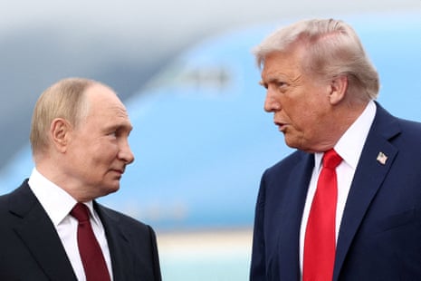 Trump and Putin stand close, facing each other with serious expressions