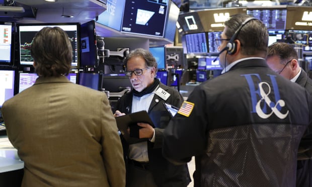 Traders work on the floor of the New York stock exchange on Wall Street in New York City on 25 April 2022.