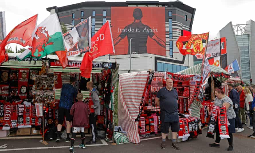Merchandise sellers outside Old Trafford on Saturday.
