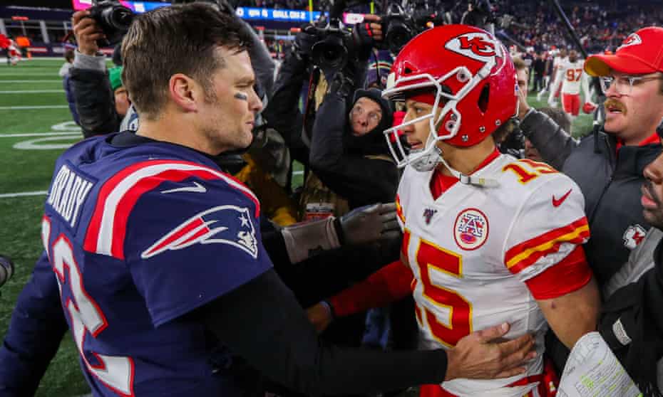 Tom Brady and Patrick Mahomes greet each other after a playoff game in January 2019