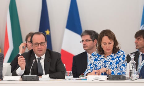 Francois Hollande and environment minister Segolene (right) announces funds for Africa to install clean energy and battle desertification.
