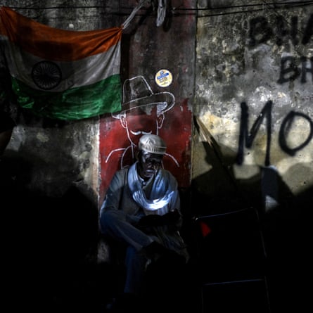 A CJP supporter sitting against a wall