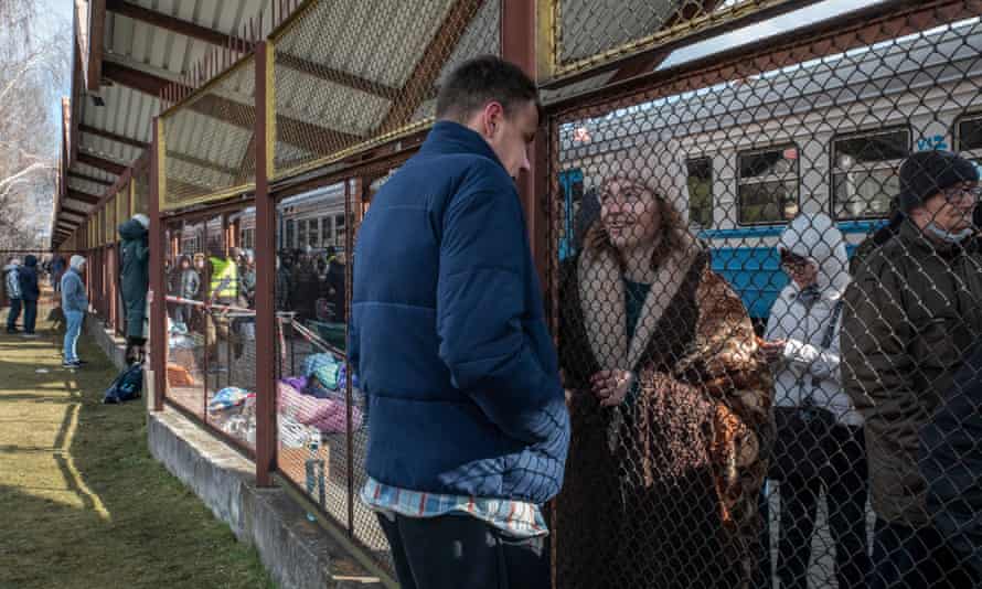 A man and a woman at Przemyśl train station