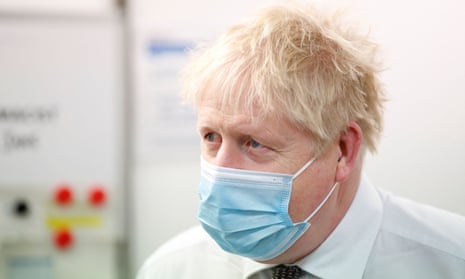 Boris Johnson during a visit to a Covid vaccine centre in Northampton.