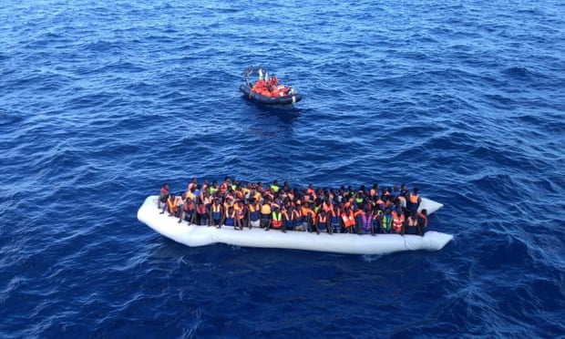  Migrants in a dinghy are rescued in the Mediterranean sea on Friday. Photograph: Maria Carla Giugliano/AP