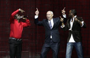 Powell dances on stage with Olu Maintain, left, at the Africa Rising festival at the Royal Albert Hall, London, in 2008