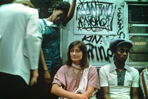 a Willy Spiller photo titled "Jerome Avenue IRT Line, 1980": people sitting and standing inside a graffiti-covered subway carriage