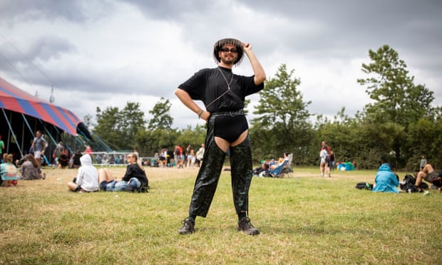 A festivalgoer wears chaps at Glastonbury festival
