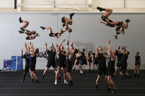 Members of the Unity Allstars Black cheerleading team training in the gym