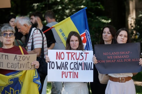 People holding signs