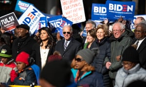 Jaime Harrison with presidential candidates Tulsi Gabbard, Joe Biden, Amy Klobuchar, Elizabeth Warren and Bernie Sanders in Columbia, South Carolina.