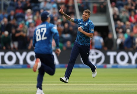 Brydon Carse celebrates taking the wicket of West Indies' Jewel Andrew.
