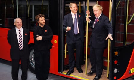 Mayor Boris Johnson unveils a life size mock up of the New Bus for London inspired by the old routemaster. For News. L to R; Unknown, Thomas Heatherwick, Owen Paterson (Secretary of State for Northern Ireland) and Boris Johnson Photo by Linda Nylind. 11/11/2010