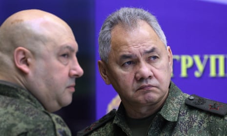 The top Russian military commander in Ukraine, Gen Sergei Surovikin, left, and the Russian defence minister, Sergei Shoigu, attend the meeting.