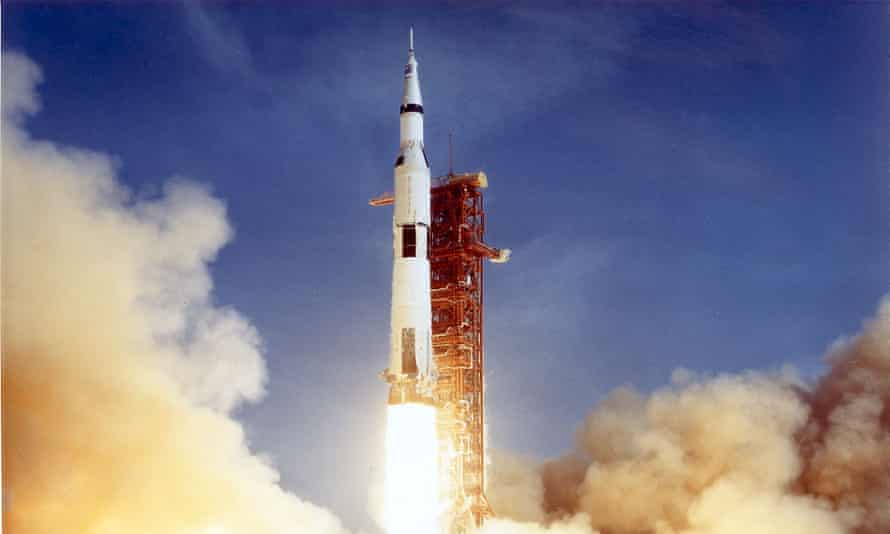 Rocket ship taking off in plumes of smoke
