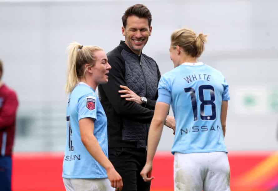 Gareth Taylor in conversation with Lauren Hemp (left) and Ellen White at the end of an FA Cup game in May.