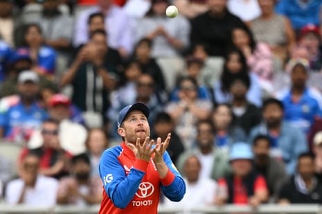 Liam Dawson takes a catch to dismiss India's Ishan Kishan