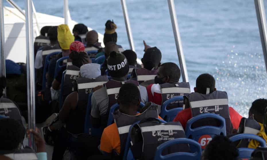 Haitian people onboard a boat