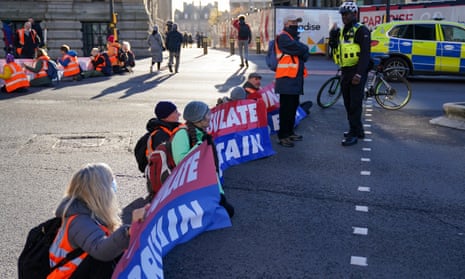 Protesters from Insulate Britain blocking Great Charles Street Queensway in Birmingham.