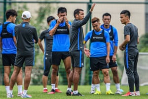 Guangzhou’s head coach Giovanni van Bronckhorst takes a training session in April.