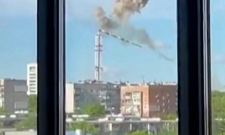 Television tower in Ukraine collapses after missile strike – video