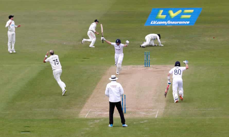 England’s Joe Root celebrates reaching his century with Ollie Pope