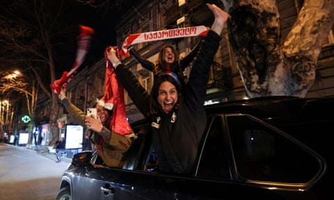 Georgia fans take to the streets after their penalty shootout victory in the playoffs against Greece in March