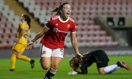 Kirsty Hanson celebrates after scoring the first goal of the WSL season in Manchester United’s win over Reading.