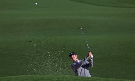 Justin Rose plays out from the bunker on the 2nd hole during his second round at Augusta.