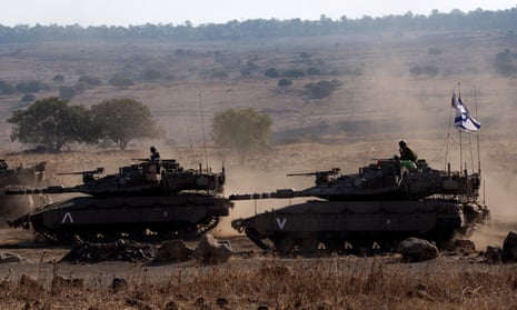 Israeli Merkava tanks take part in recent large-scale war games in the Golan Heights.