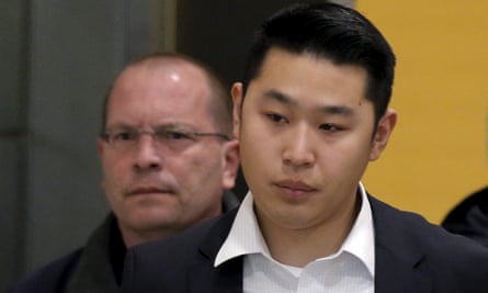 Peter Liang is led from the courtroom at the Brooklyn supreme court in February.