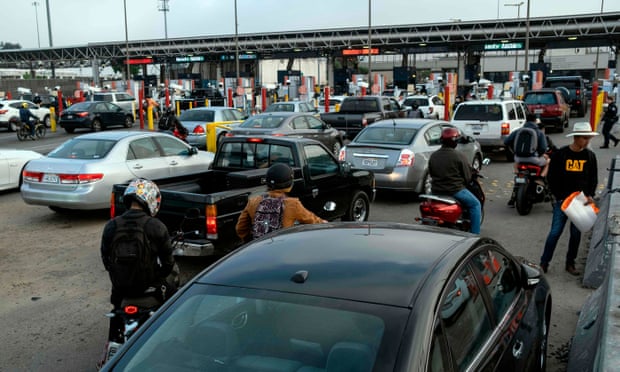 Vehicles queue to cross US-Mexico border at the Otay commercial crossing port in Tijuana on Tuesday.
