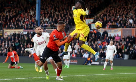 Carlton Morris beats André Onana to bring Luton back in to the game.