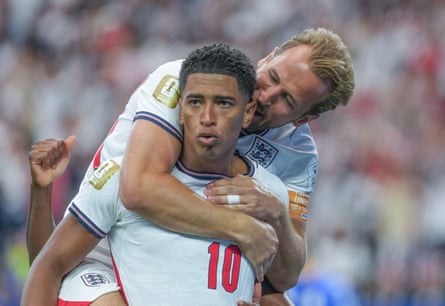 Harry Kane hugs Jude Bellingham