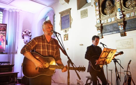 ‘Both men know how to make a guitar drive and ring’: Billy Bragg and Joe Henry at London’s St Pancras Old Church. 