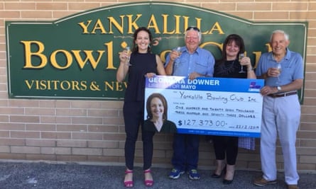 A photograph from Georgina Downer’s Facebook page shows her presenting a cheque to the Yankallila bowling club