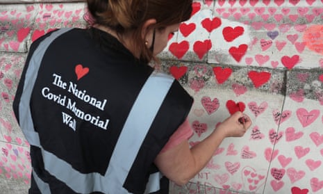 Team member painting a heart