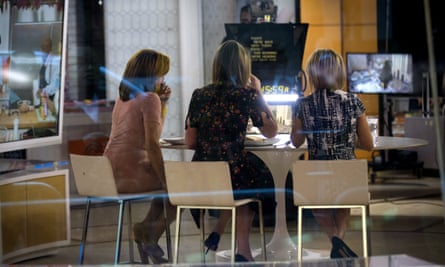 Hoda Kotb, Savannah Guthrie and Dylan Dreyer sit at a table during a break on the set of NBC’s Today Show, Wednesday in New York City.