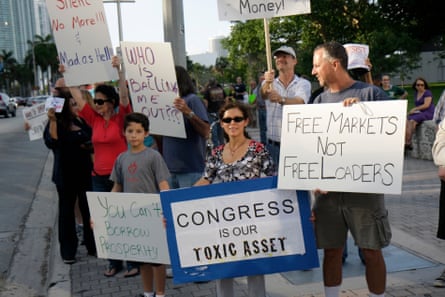 people holding signs